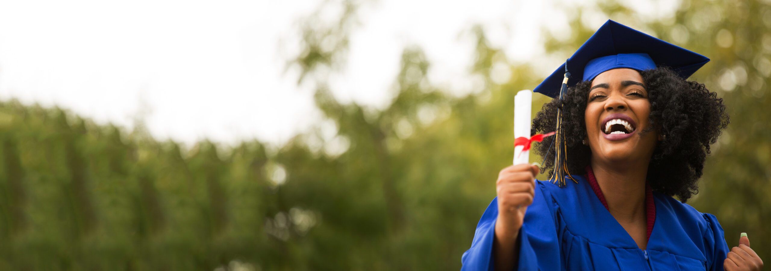 Portriat of a young African American Woman at graduation.